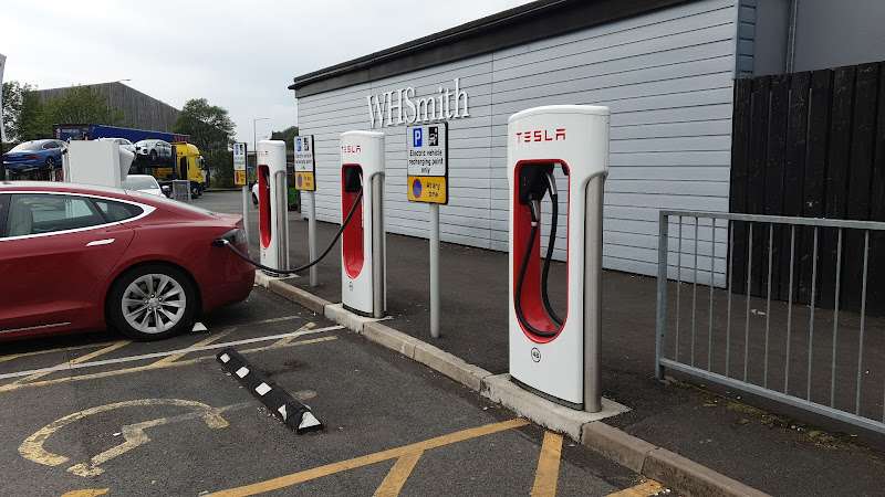 Tesla Supercharger EV Charging Station at 15/16 M6