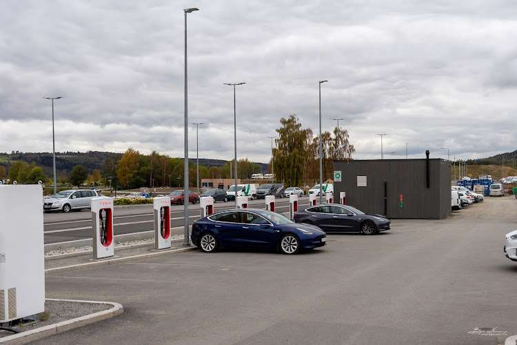 Tesla Supercharger EV Charging Station at Nils Amblis v. 1A