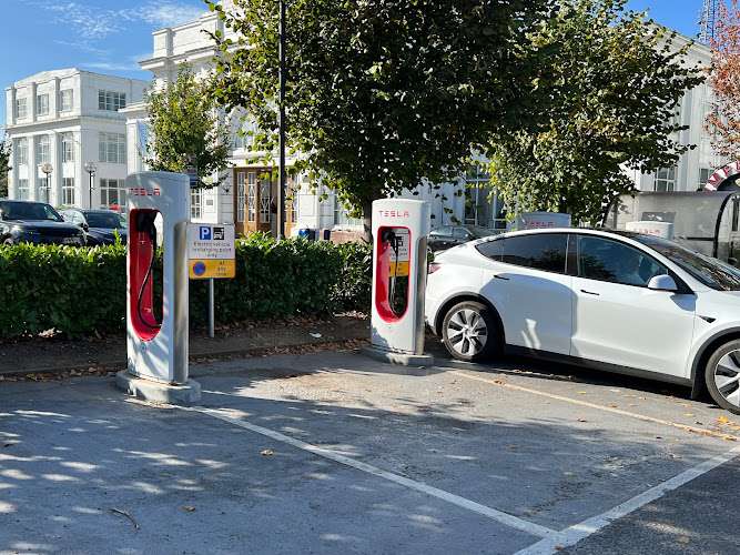 Tesla Supercharger EV Charging Station at Airport House