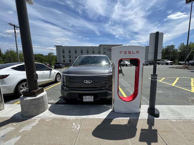 Tesla Supercharger EV Charging Station at Thompson Square Mall