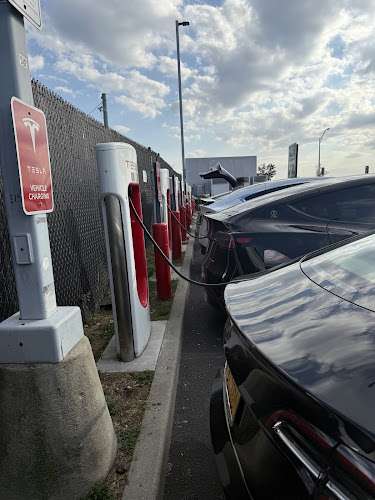 Tesla Supercharger EV Charging Station at 150th Ave &