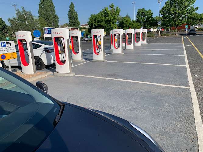 Tesla Supercharger EV Charging Station at MPXM+CW