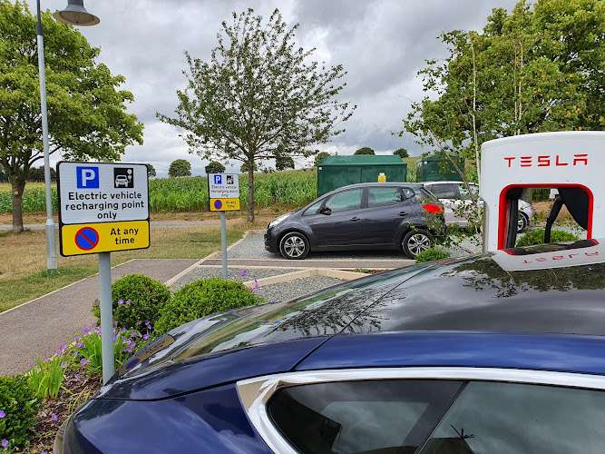 Tesla Supercharger EV Charging Station at Darts Farm