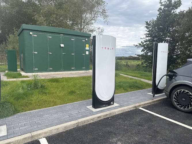 Tesla Supercharger EV Charging Station at Todhills
