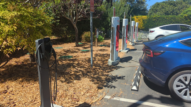 Tesla Supercharger EV Charging Station at Farmhouse