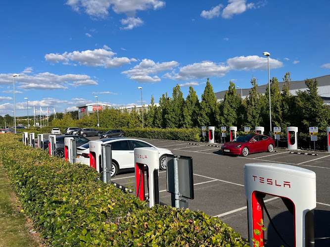 Tesla Supercharger EV Charging Station at Mid Summer Pl