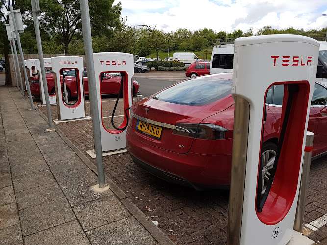 Tesla Supercharger EV Charging Station at Road