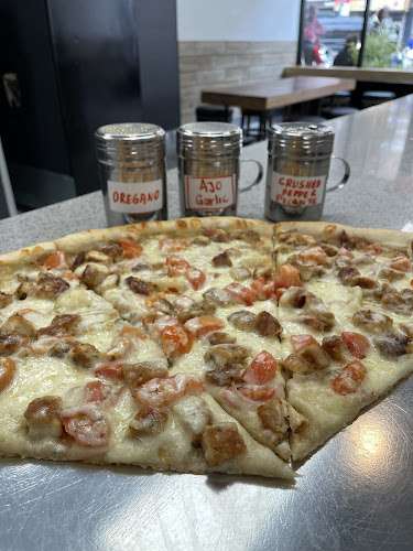 Pizza Nova EV Charging Station at 523 W 207th St