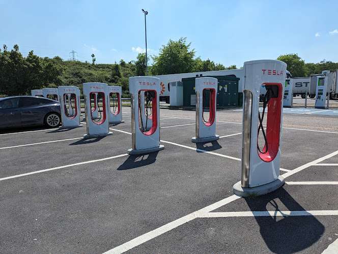 Tesla Supercharger EV Charging Station at Junction 4 and 5