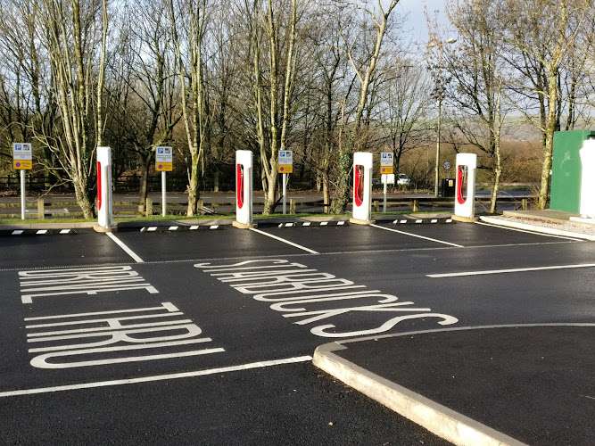 Tesla Supercharger EV Charging Station at M4 Junction 36