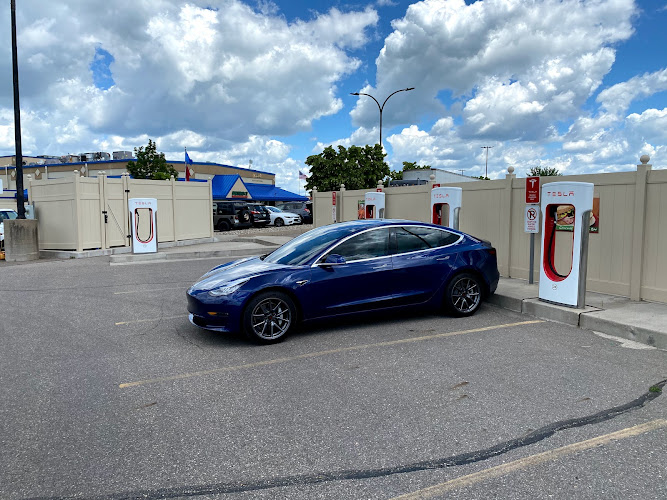 Tesla Supercharger EV Charging Station at 950 MN-24