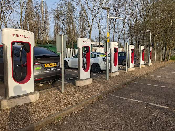 Tesla Supercharger EV Charging Station at M25 Motorway