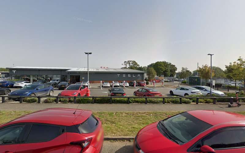Tesla Supercharger EV Charging Station at Tesla Service Centre