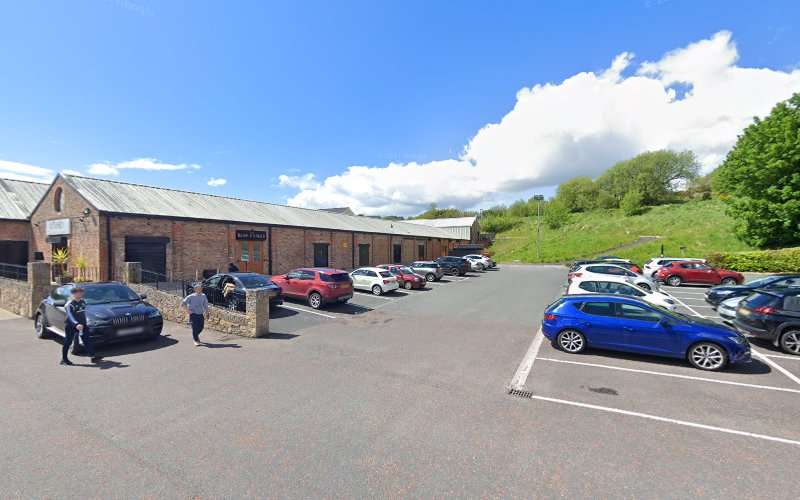 Tesla Supercharger EV Charging Station at Linen green